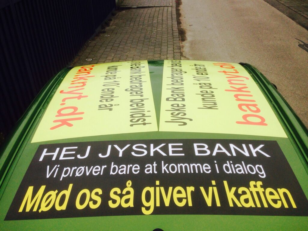Vedtægter § 1 Stk. 1: Bankens navn er Jyske Bank A/S. Stk. 4: Bankens formål er som bank og som moderselskab at drive bankvirksomhed efter lovgivningen Stk. 5: Banken drives i overensstemmelse med redelig forretningsskik, god bankpraksis og bankens værdier og holdninger :-) :-) Lidt søge ord. #Justitsministeriet #Finansministeriet #Statsministeriet JYSKE BANK BLEV OPDAGET / TAGET I AT LAVE #MANDATSVIG #BEDRAGERI #DOKUMENTFALSK #UDNYTTELSE #SVIG #FALSK / #Bank #AnderChristianDam #Financial #News #Press #Share #Pol #Recommendation #Sale #Firesale #AndersDam #JyskeBank #ATP #PFA #MortenUlrikGade #PhilipBaruch #LES #Boxen Jyske Bank Boxen #KristianAmbjørnBuus-Nielsen #LundElmerSandager #Nykredit #MetteEgholmNielsen #Loan #Fraud #CasperDamOlsen #NicolaiHansen #JeanettKofoed-Hansen #AnetteKirkeby #SørenWoergaaed #BirgitBushThuesen #Gangcrimes #Crimes #Koncernledelse #jyskebank #Koncernbestyrelsen #SvenBuhrkall #KurtBligaardPedersen #RinaAsmussen #PhilipBaruch #JensABorup #KeldNorup #ChristinaLykkeMunk #HaggaiKunisch #MarianneLillevang #Koncerndirektionen #AndersDam #LeifFLarsen #NielsErikJakobsen #PerSkovhus #PeterSchleidt